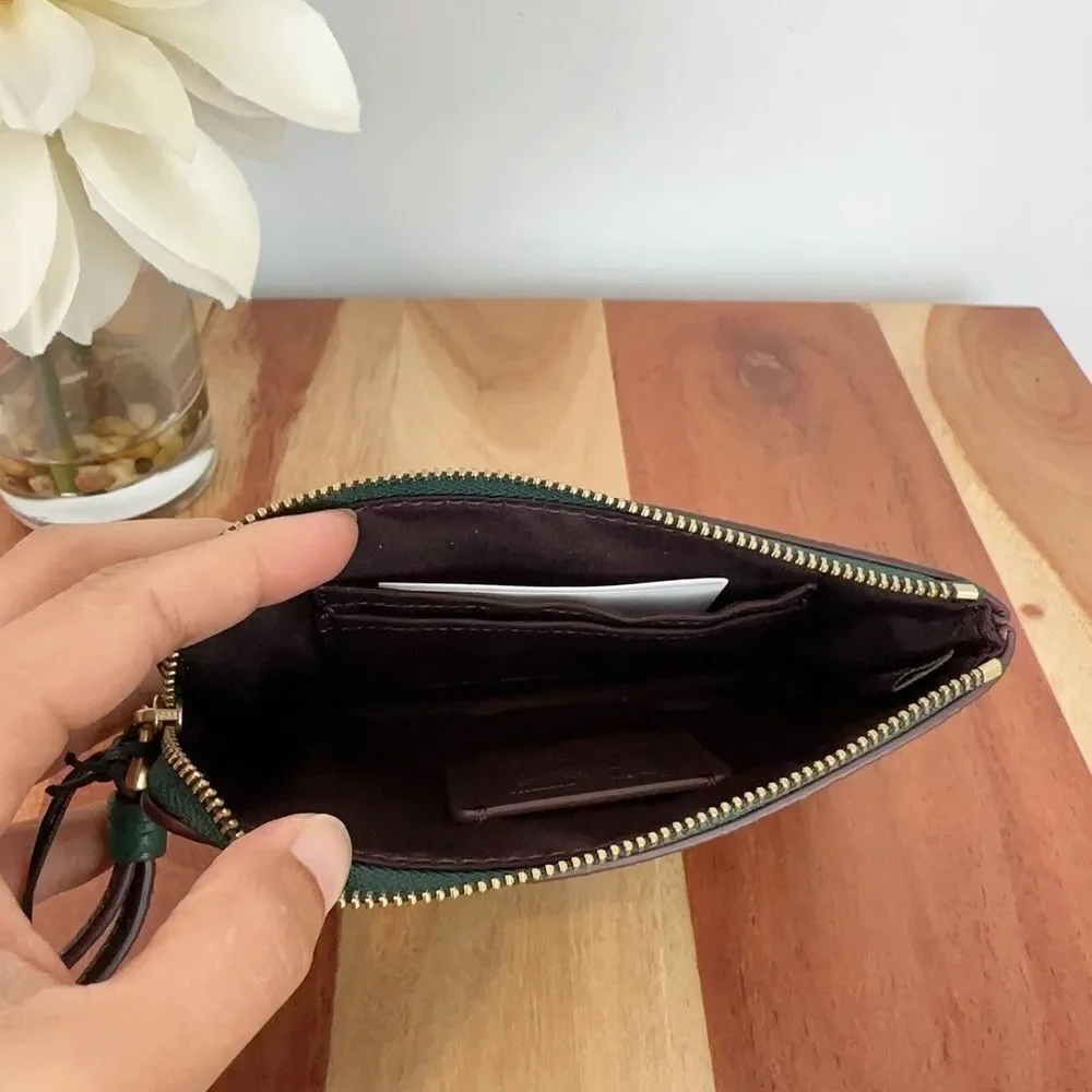 NWT Disney X Coach Corner Zip Wristlet With‎ Sled Motif